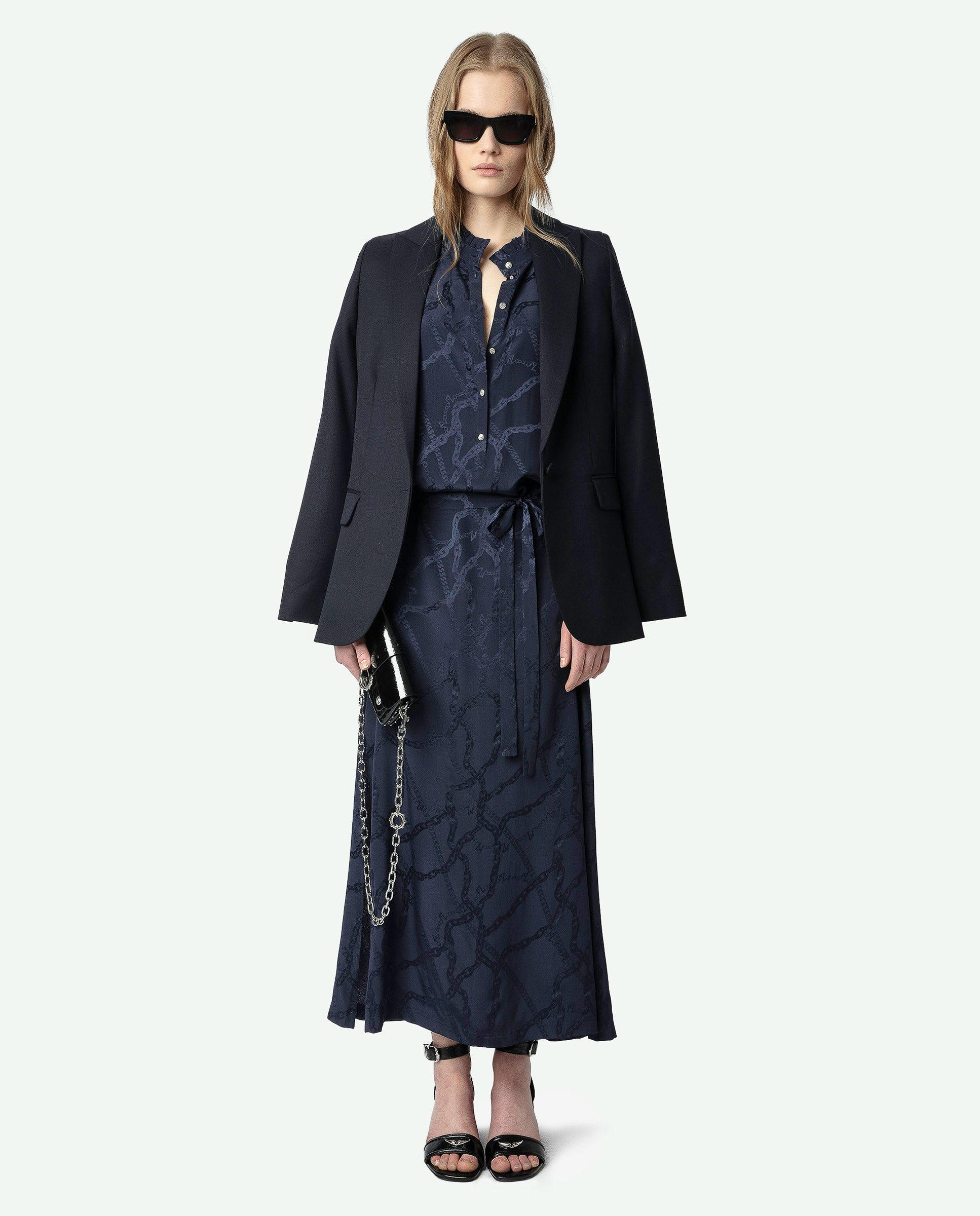 Caprese Sandals - Heeled sandals with leather strap adorned with a wing charm and a signature buckle.